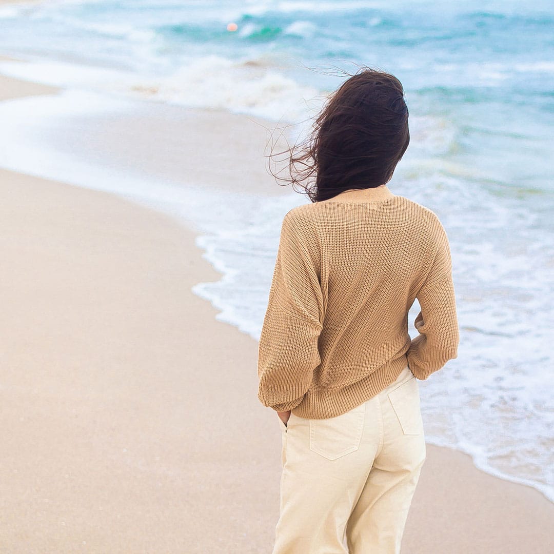 woman on beach retreat